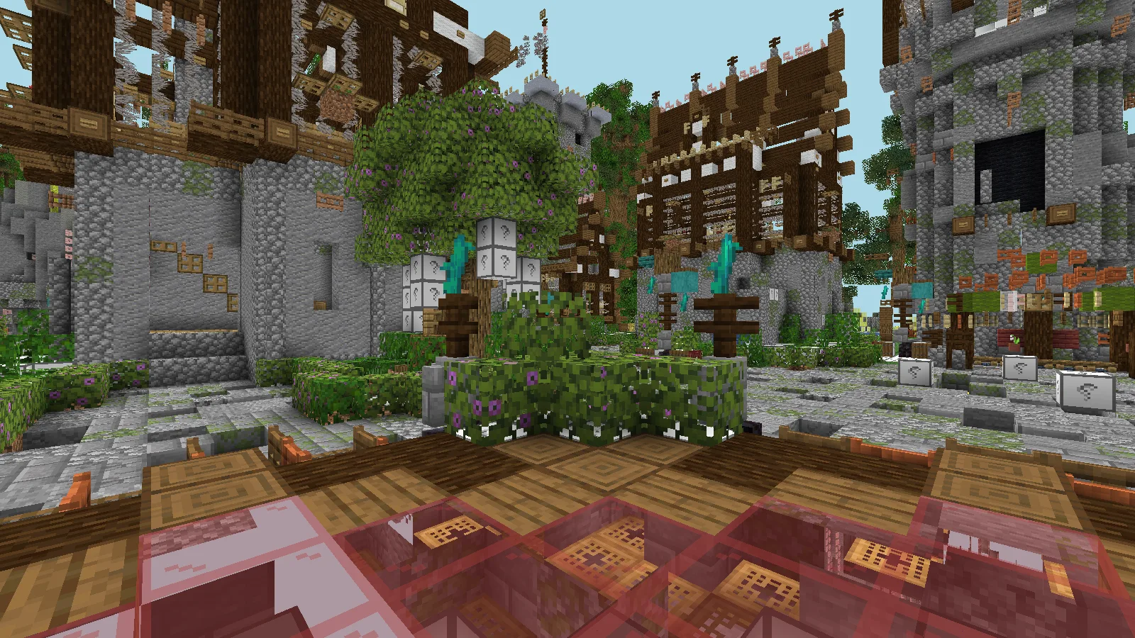 Stone tower and timber buildings around the hub garden