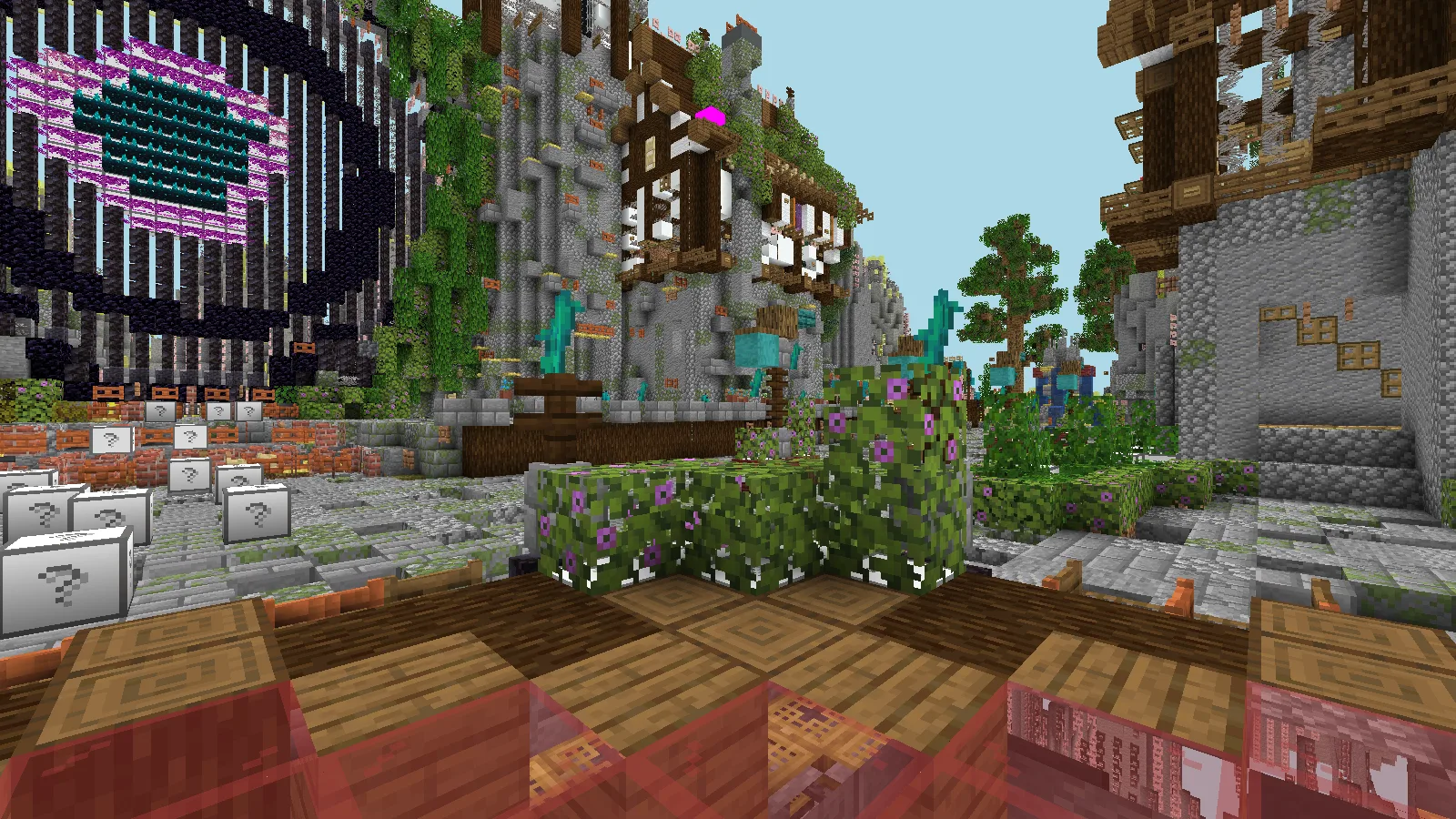 Hub emblem rising beyond a flower-lined path